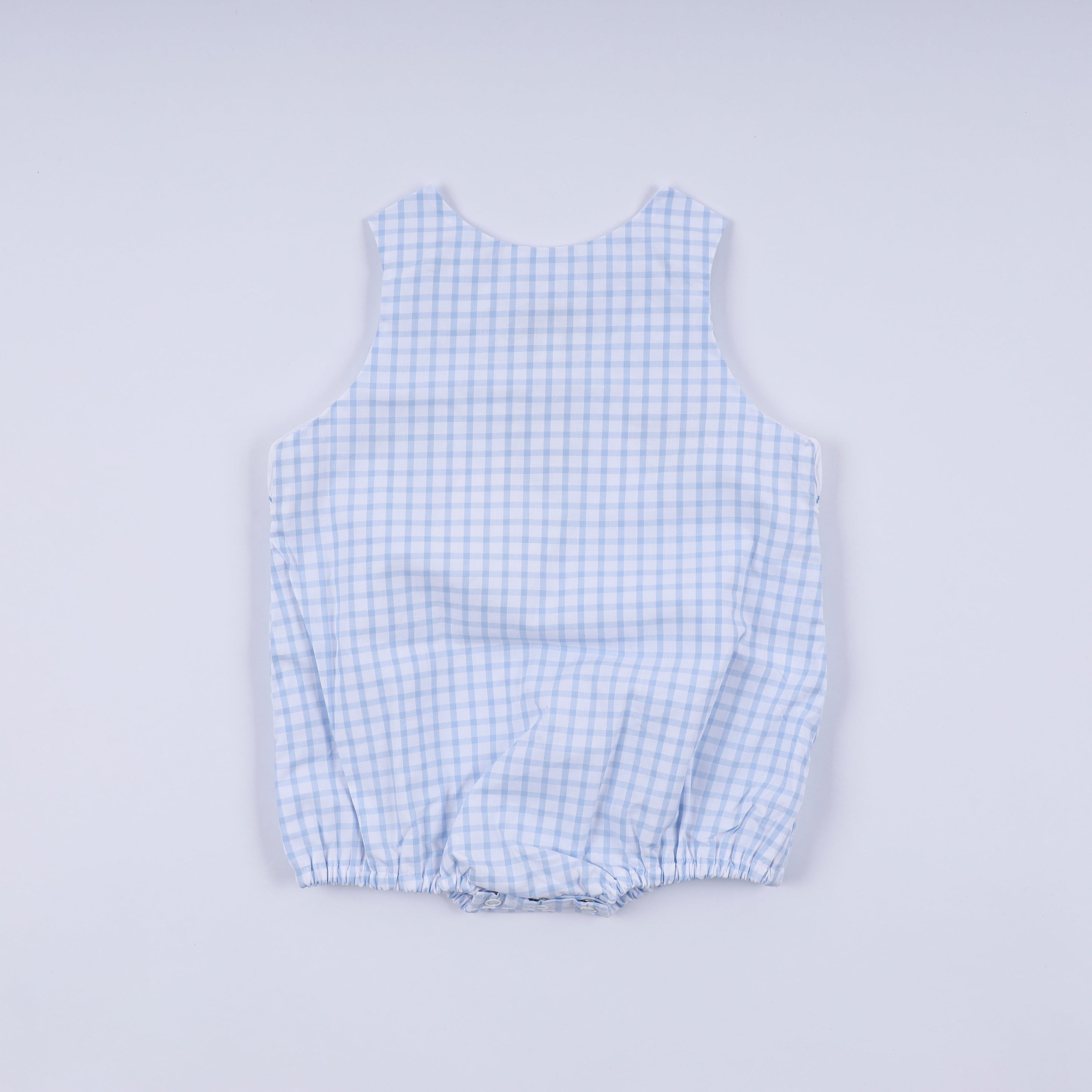 Blue character hand smocked gingham bubble