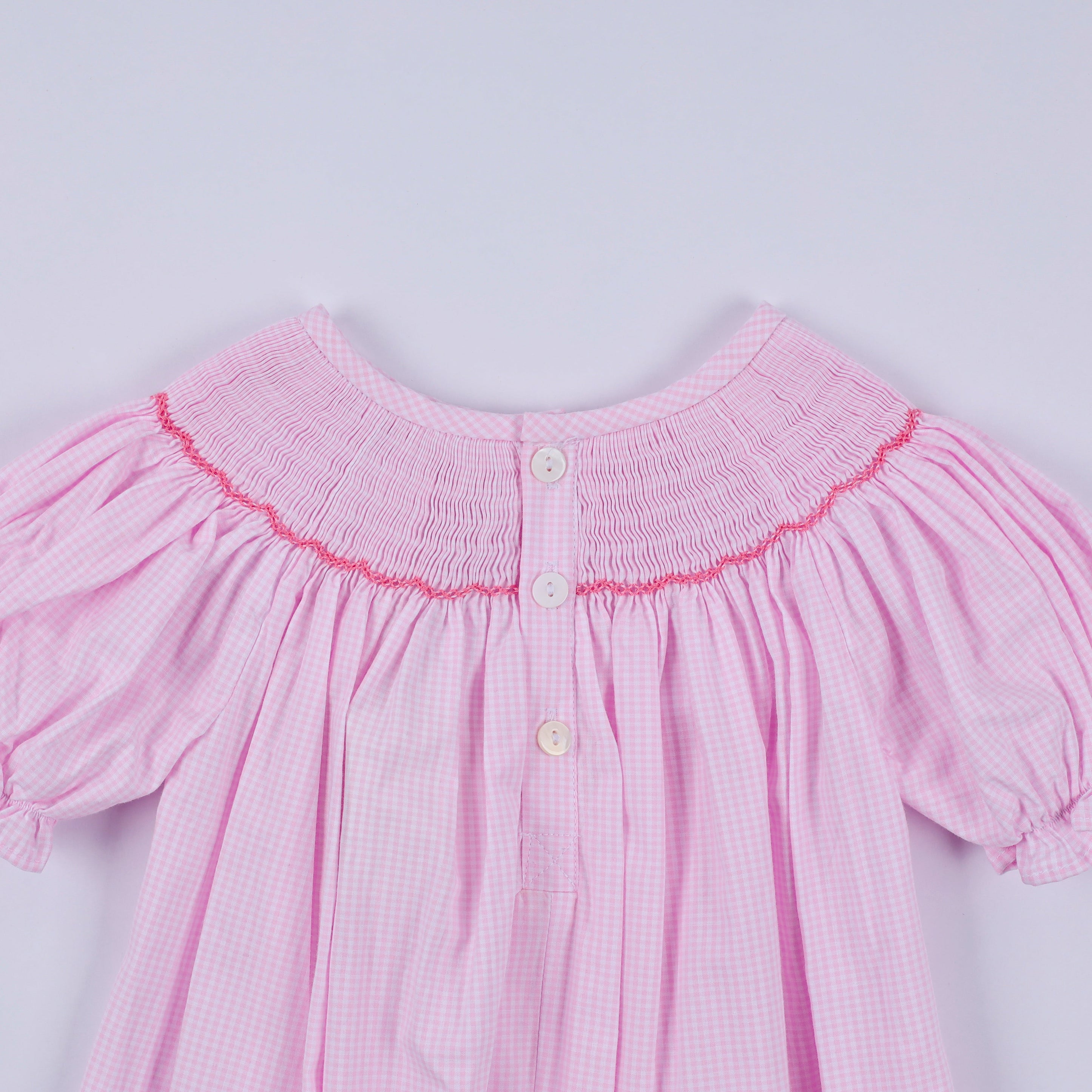 Pink christmas tree hand smocked ruffle romper