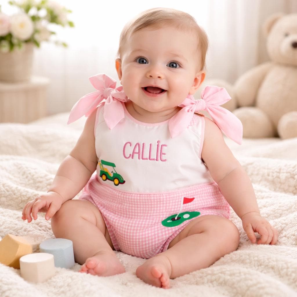 Golf bubble romper for girls with embroidered designs and name.