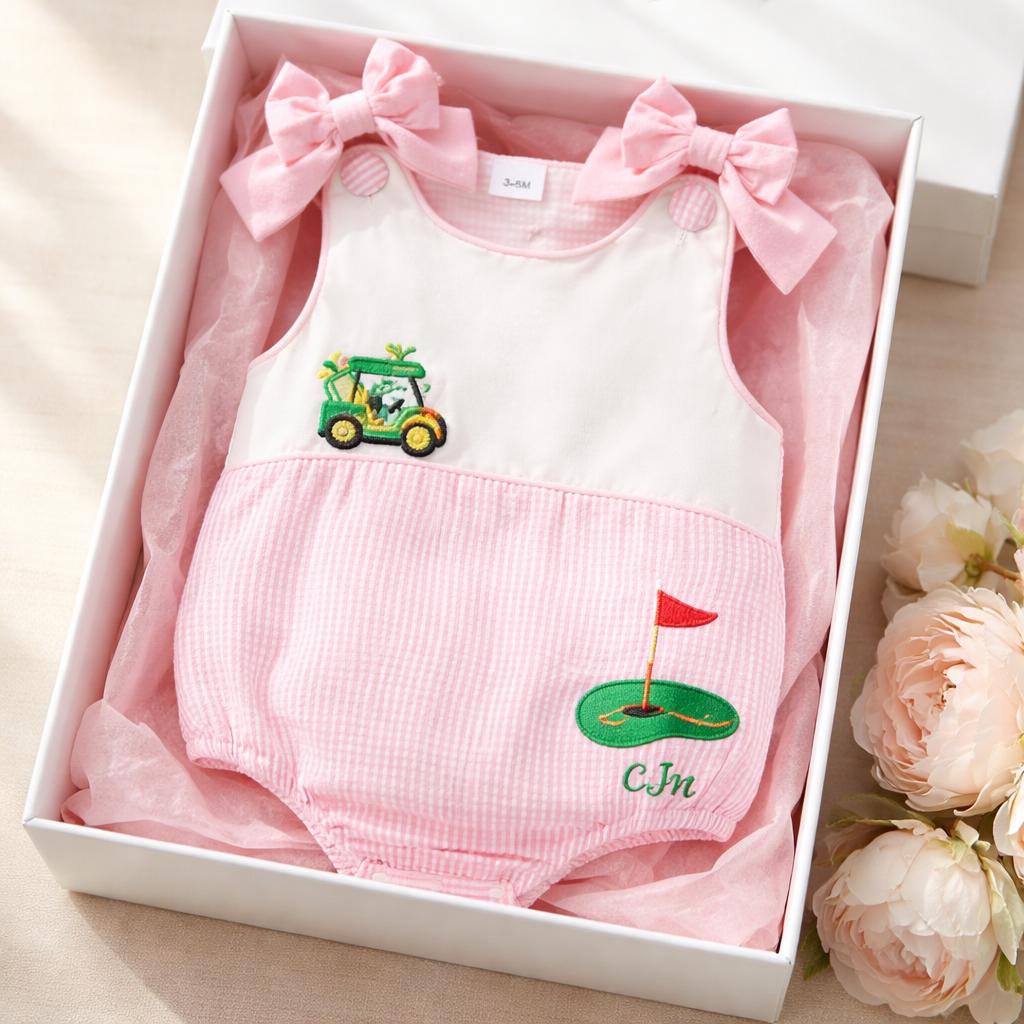 Golf bubble romper for girls with embroidered designs and name.
